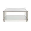 A modern coffee table with a minimal design featuring a glamorous gold frame and beautiful bevelled glass edges