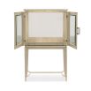 A luxury bar cabinet with leaf motif embellishments and a champagne finish