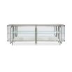 A contemporary console table by Caracole with clear, wave-effect acrylic doors and a mirrored interior