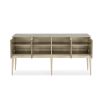 A dazzling sideboard by Caracole with mirrored glass doors and a glamorous gold finish