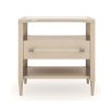 Striking and glamorous bedside table with curved surface, shelving and drawer for storage