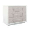 Contemporary bedside chest with clear acrylic handles and textured front of drawers