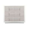Contemporary bedside chest with clear acrylic handles and textured front of drawers