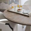 Breathtakingly elegant round dining table with lightly distressed appeal 