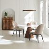 Classy neutral dining chair with simple curved silhouette