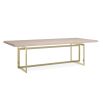 Elevate your dining space with the Brentel Dining Table from Caracole, featuring a stunning gold finish and elegant travertine top. Perfect for modern luxury.