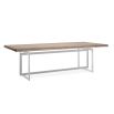 Elevate your dining experience with the Brentel Dining Table by Caracole, featuring a sleek chrome base and elegant sandstone top. Stylish and modern!