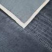 A mesmerising navy velvet quilt with handstitched details