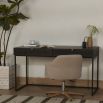 Dark wooden desk with ridged detailing