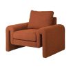 in a rust boucle, this elegant armchair features curving arms and a retro-chic design