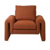 in a rust boucle, this elegant armchair features curving arms and a retro-chic design
