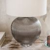 Side lamp with large grey glass ribbed base