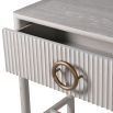 White washed wood console table with brass finish handles