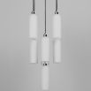 A luxury chandelier by Schwung with 9 frosted, opal glass shades and a glamorous polished nickel finish 
