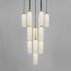 A luxurious chandelier by Schwung with translucent opal glass lampshades and a solid brass structure