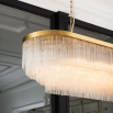 Elevate your space with the Opaline Linear Chandelier from our Luxe Collection. Elegant design meets ambient lighting for a stunning focal point.