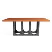 The Coliseum Dining Table features a cork table top supported by ebonized oak arches, blending modern design with organic materials and seating up to eight.