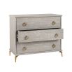 Chic, French-style chest of drawers with rounded handles. 
