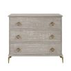 Chic, French-style chest of drawers with rounded handles. 