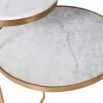 glamorous brass frame side table with white marble surfaces