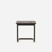 A luxurious brown laminate and painted steel side table 