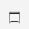 A luxurious brown laminate and painted steel side table 