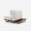 A luxurious upholstered outdoor right-hand armchair with a painted steel base