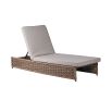 A beautiful and adjustable rattan outdoor lounger complete with two grey soft seat cushions