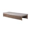 A beautiful and adjustable rattan outdoor lounger complete with two grey soft seat cushions