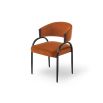 Sophisticated dining chair with black frame and orange velvet seat upholstery