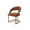 Sleek dining chair with bronze finish base and luxuriously sumptuous seat