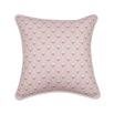 A baby pink cushion with pink and white floral motifs