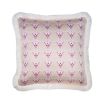 A stunning pink cushion with delicate white fringing