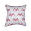 A stunning white cushion with matching piping and a delicate pink leaf-like pattern