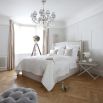 Luxury, French-style bed with small wings and French studding on a sprung slatted base