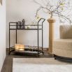 dazzling black bar cart with wheels and two shelves