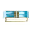 An elegant antiqued glass and polished brass maximalist credenza