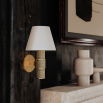 Illuminate your space with the Denton Wall Sconce, featuring a sleek design that blends modern elegance with functionality. Perfect for any room!