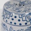 ceramic stool boasts a beautiful blue and white bird design