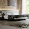Luxury, contemporary style bed with linen and leather details