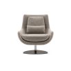 A luxurious armchair by Domkapa with a polished base