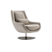 A luxurious armchair by Domkapa with a polished base