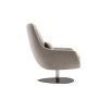 A luxurious armchair by Domkapa with a polished base