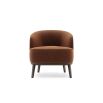 A luxurious round, boucle retro-inspired armchair 