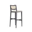 A luxurious traditional Portuguese bar stool with a luxury upholstery and woven details