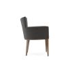 A chic modern mid-century modern dining armchair with wooden legs