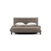 Luxury chic, art deco bed upholstered in a beautiful boucle