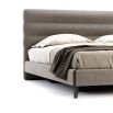 A luxurious chic luxury upholstered bed by Domkapa