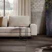 A contemporary upholstered 2 seater sofa by Domkapa with polished stainless steel legs