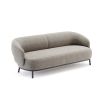 A luxurious linen upholstered sofa by Domkapa
